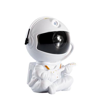 China Modern Muti-color Sitting Astronaut Projector Ocean Wave Star Light Galaxy projector Baby led Astronaut Lamp Starry Night Sky Projector for sale