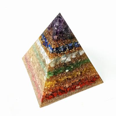 China Donghai Orgone Pyramid Healing Stones Orgonite Seven Chakras Crystal Pyramid Gravel Energy Amplifier For Meditation Purification for sale