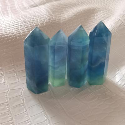 China High Quality Light Blue Crystal Wand Point Sky Blue Point Fluorite Donghai Fluorite Wholesale Natural Blue Tower Gemstone For Healing for sale