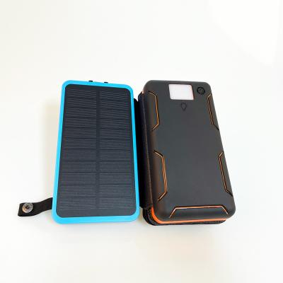 China 10000mah indoor outdoor foldable mobile phone hot sale solar power portable solar phone charger with led light for sale