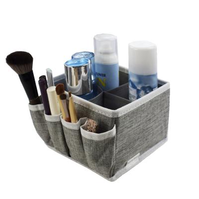 China Sustainable Wholesale Fabric Makeup Organizer With Drawers Market Folding Cosmetic Display Storage Boxes for sale