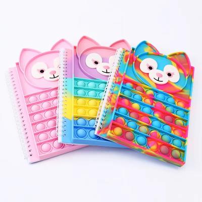 China 2021 New Custom Silicone Popular Doll Printed Colorful Busty Person Push Link Dye Pop Notebook Pop Silicone Notebook For Kids for sale