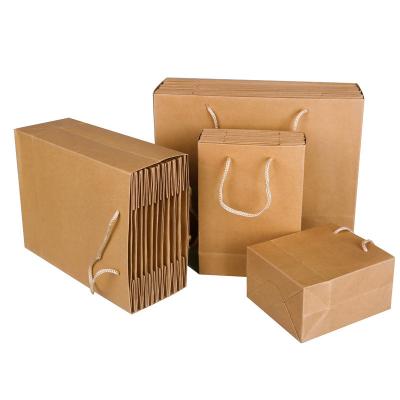 China Custom Wholesale Good Quality Biodegradable Kraft Paper Bags with Logo Shopping Paper Bags for sale