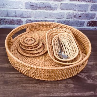 China Wholesale Handmade Rattan Round Serving Tray Hand Woven Serving Basket with Handles for Dinner Breakfast for sale