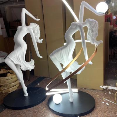 China New creative post-modern humanoid art sculpture floor lamp designer shopping mall club sales service dance goddess position lamp for sale