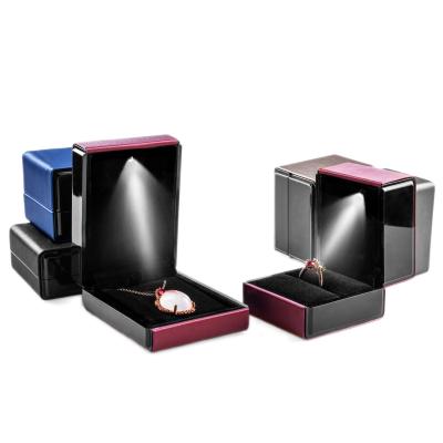 China Jewelry Packaging New Brushed PU Luminescent Jewelry Box LED Jewelry Box Ring Bracelet Box for sale