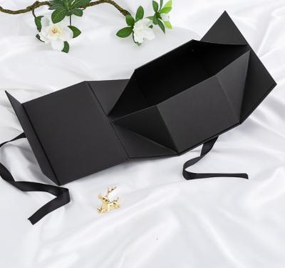 China Disposable Custom Logo Black Luxury Cardboard Gifts Magnetic Folding Gift Box Packaging Closure With Foam for sale