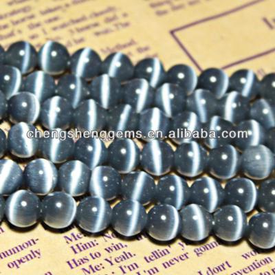 China Round Smooth Gray Pleochroic / Pleochroism 10mm Loose Cat Eye Beads For Sale for sale