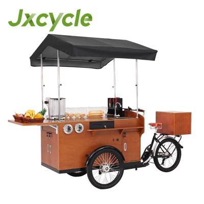 China The Cargo Food Bike is a kitchen on wheels moved by a combination of human-strength and green electricity for sale