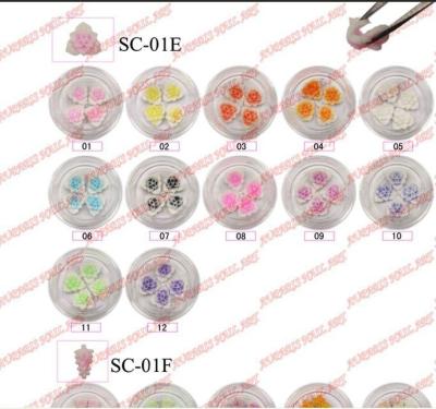 China Wholesalers 12 Colors Plastic 3D Nail Sticker Ceramic Flower For Nail Art Tips Decorations for sale