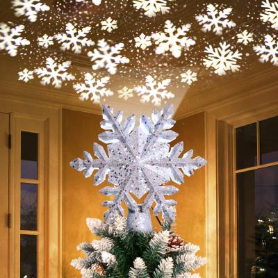 China Made of PVC and Snowflake Shaped Top Light Star Led Christmas Tree Decor LED Lamp Projection Premium Christmas Tree Topper EU USA UK Plug Ourwarm for sale