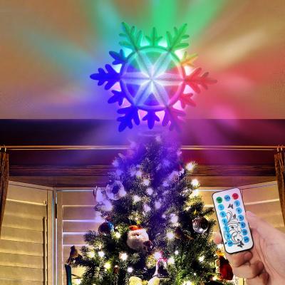 China PVC New Style Multifunctional 11 Modes Snowflake Shape Led Lit Topper Lighted Projection Christmas Tree for sale