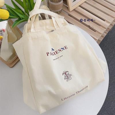 China New Style Eco-Friendly Wholesale Simple School Fashion Logo Custom Printing Zero Scrap Handbag For Women Canvans Shoulder Tote Shopping Bag for sale