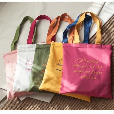 China New Hot Selling Custom Handled Logo Cotton Canvas Shopping Handles Christmas Grocery Plain Gift Bag Custom Packaging for sale