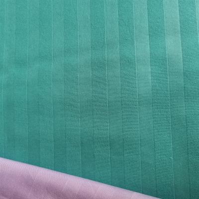 China Waterproof Solid Color Embossed Fabric 100% Polyester Dyed Stripe Bed Sheet Fabric for sale