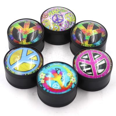 China Different Colors 2 Inch Portable Grinder With Crystal Image Circular Symbol Pattern Smoking Sets Maker for sale