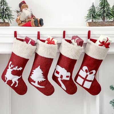 China 2020 New Style Soulmate Santa Socks 46x27cm Candy Bag Gifts Fishbone Stocking Christmas Decoration Tree Safe Environmental Materials Ornaments Festival for sale