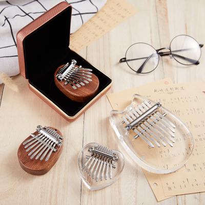 China Eco-friendly kalimba crystal acryl set 8 mini kalimba wooden strumenti musicali small head wooden kalimba toys toys instruments for sale