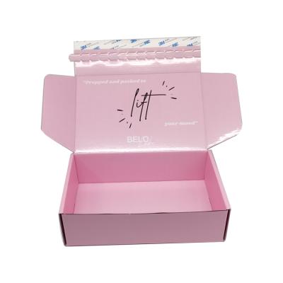 China Recyled Materials Logo Customized Cosmetic Packaging Skin Care Product Set Pink Simple Corrugated Cardboard Gift Announcement Box for sale