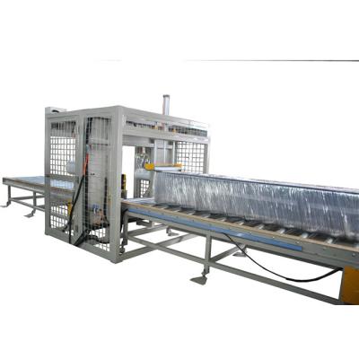 China Horizontal Food Stretch Wrapping Film Machine For Pipe Goods Wrapping for sale