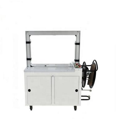 China Factory price automatic food strapping machine with foot switch for sale for sale