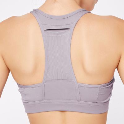 China The New Breathable Sports Bra With Full Back Pocket Shockproof Horizontal Bar Mesh Splicing Sports Underwear Yoga for sale