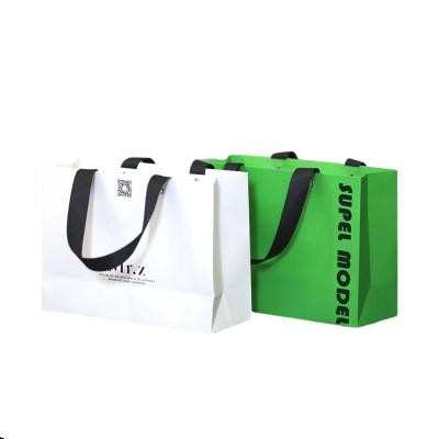 China Recycled Logo Paper Packaging Materials Euro Custom Shoes Gift Shoes Packaging Shopping Bags With Ribbon Handles for sale