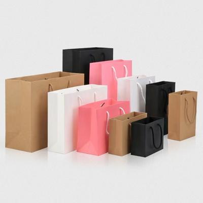 China Recycled Materials Paper Bag Gift Bag Pink With Handles Custom Luxury Kraft Paper Engraving Printing Thank You White Paper Gift Carrier Kraft Bags for sale