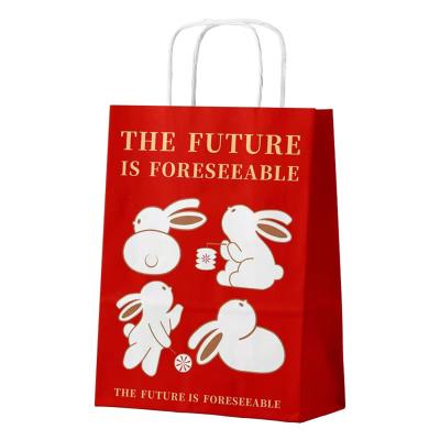 China Biodegradable Custom Logo Kids Party Gift Wrapping Hand Wrapping Brown Craft Paper Shopping Bag With Handle for sale