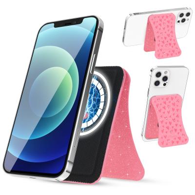 China Unique Anti-fall Designer Pressing Heart Crystals Gems Magnetic Card Holder For iPhone Magnet Phone Card Wallet Pocket for sale