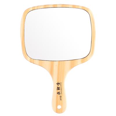 China China Wooden Hand Mirror Makeup Mirror A Mirror To Carry Around With You for sale