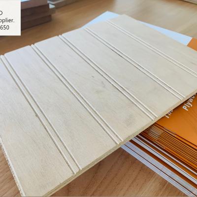 China Modern Fluted Waterproof Plywood 1220mm x 2440mm Pine 4*8 U V W Flute Commerical Plywood Timber for sale