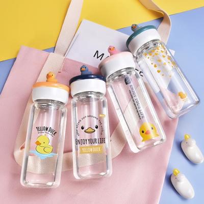 China Wholesale Price Cartoon Duck Design BPA High Borosilicate Glass Viable Free Water Bottle With Tea Infuser for sale