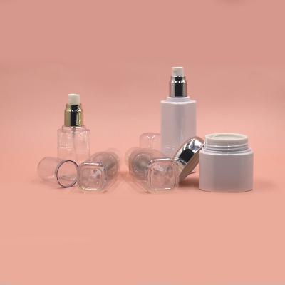 China New Design 60ml 80ml 100ml 120ml 50g Square PET Clear Black Plastic Eco-friendly Bottle Gold Cosmetic Bottle Set For Skin Care for sale