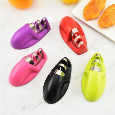 China Customizable Mouse Shaped ABS Plastic+tungsten Steel+ceramic Multi-Function Creative Logo Knife Sharpener Tungsten Ceramic Steel Sharpening Tool With Two Slots for sale