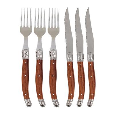 China Sustainable Rosewood Handle Western Steak Knife Stainless Steel Dinnerware Knife and Fork Set for sale