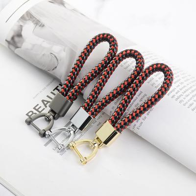 China Souvenir Gifts Promotion Car Metal Braided Key Ring Button Car Horseshoe Key Chain Pendant for sale