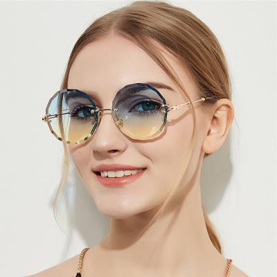 China Transparent Round Rimless Round Color Glass Sunglasses Women Feminine Women for sale