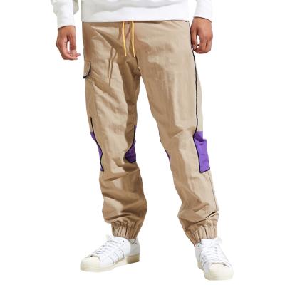 China Anti-Wrinkle ODM Fashion Pants Designer Slim Leg Side Striped Streetwear Custom Men's Trousers Pants for sale