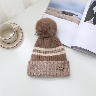 China breathable & New Plain Hand Knitted Waterproof Beanie With Custom Hats Brand Tags for sale