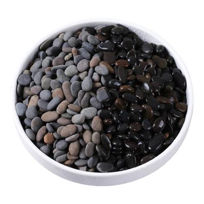 China Modern natural river rocks landscape stone flat pebbles river for sale