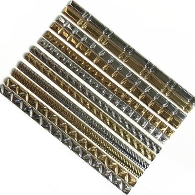 China Pencil Border Tiles New Metallic Ceramic Design Gold Glazed Luxurious Tiles for sale