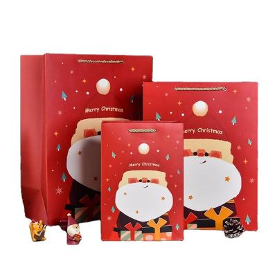 China Contain Custom Luxury Paper Ribbons Gift Bag Wrapped Striped Candy Cookie Christmas Tree Bag for sale