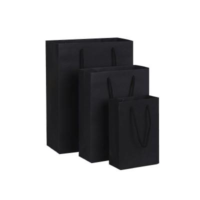 China Handmade Customized Black Packaging Paper Bags Trinkets Perfume Toys Packaging Bags Clothes Underwear Packaging Paper Bags for sale