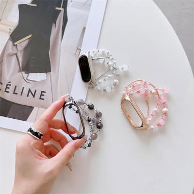 China Fashion Metal Frame Case For Xiaomi MI Band 3 4 5 6 7 Replacement Pearl 8 Bead Bracelet Watch Strap for sale