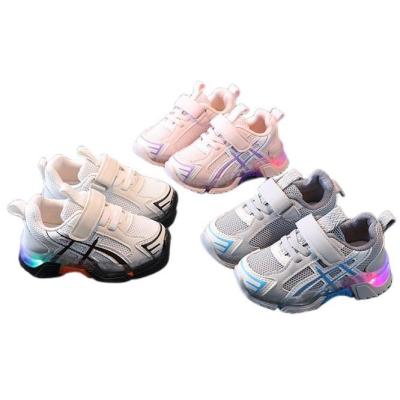 China 2022 Autumn Boys Girls Luminous LED Lighting Cartoon Breathable Actions Round Sports Shoes Mesh Shoes Student Running Children for sale