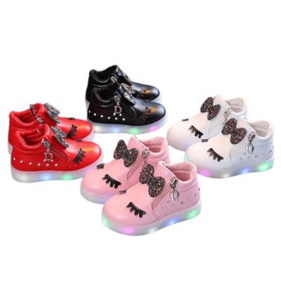 China Around 2022 new kids sports shoes girls rhinestones light up LED fashion PU running shoes kids running shoes soft single zipper fitness bow tie for sale