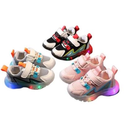 China New Kids Round Shoes Fashion Boys Girls Light Up Shoes LED Sports Breathable Non-slip Soft Sole Kids Glow Lovely Running Warm Autumn for sale