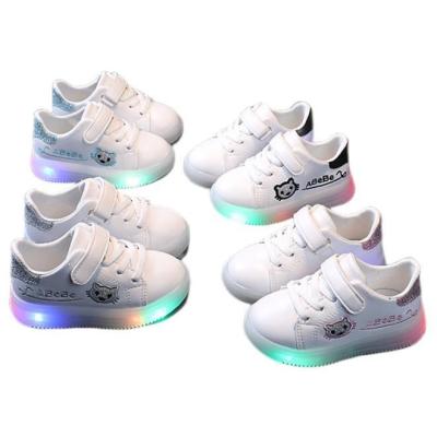 China Fashion Round Kids Shoes New Kids Boys Girls Shoes LED Light Skate Shoes Sports Cat Cartoon Comfortable Casual Sneakers for sale