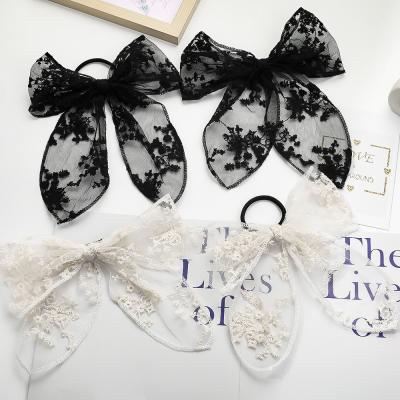 China Fashion Ladies Elastic Hair Tie Accessories Shapes Casual Bow Scrunchies Lace Printing Headwear Hair Tie for sale